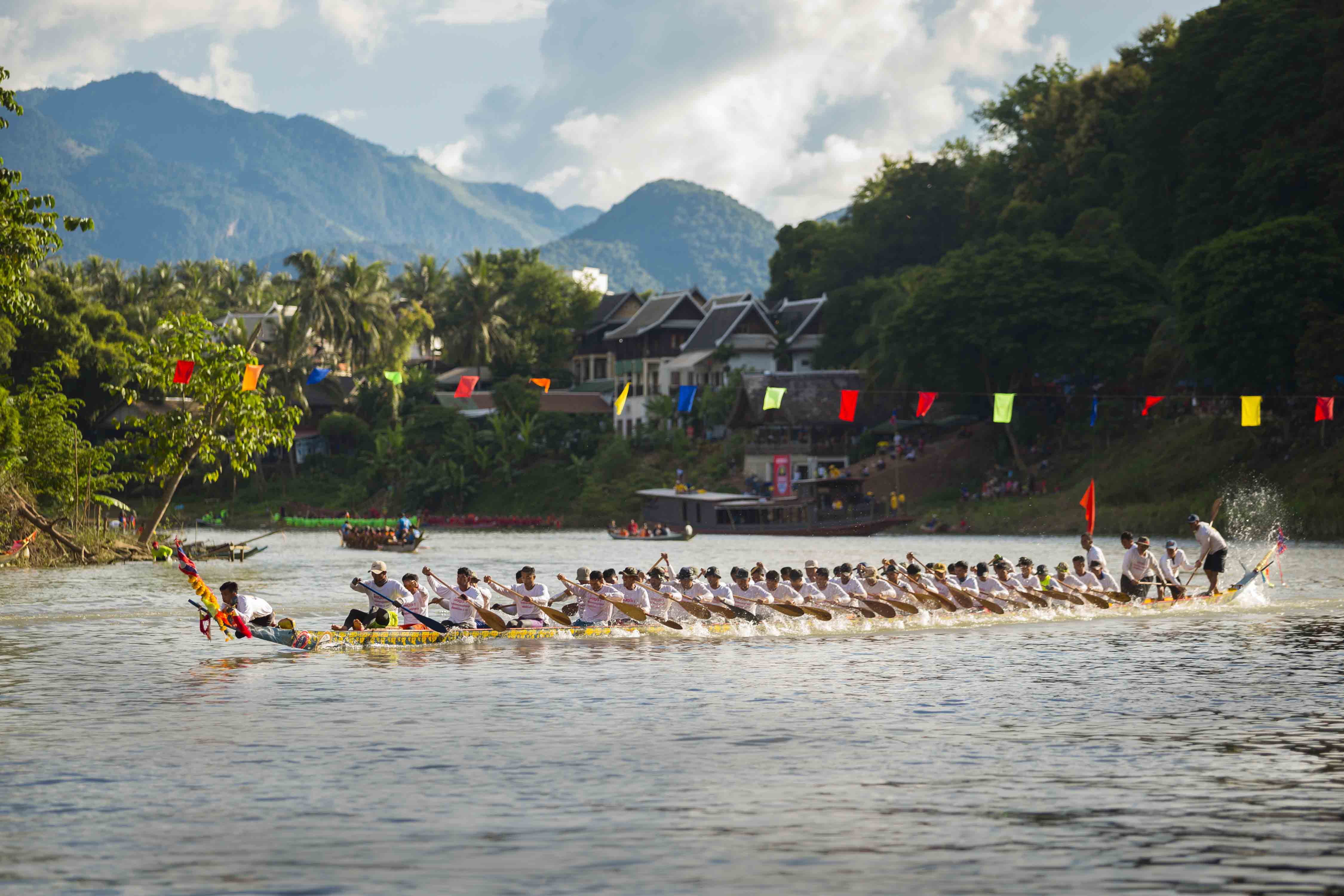 Picture: Boat racing competition on the Khan River in Luang Prabang.