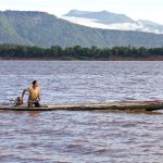 Southern-confluences-a-fisherman-on-the-mekong-heads-out-for-the-evening-catch