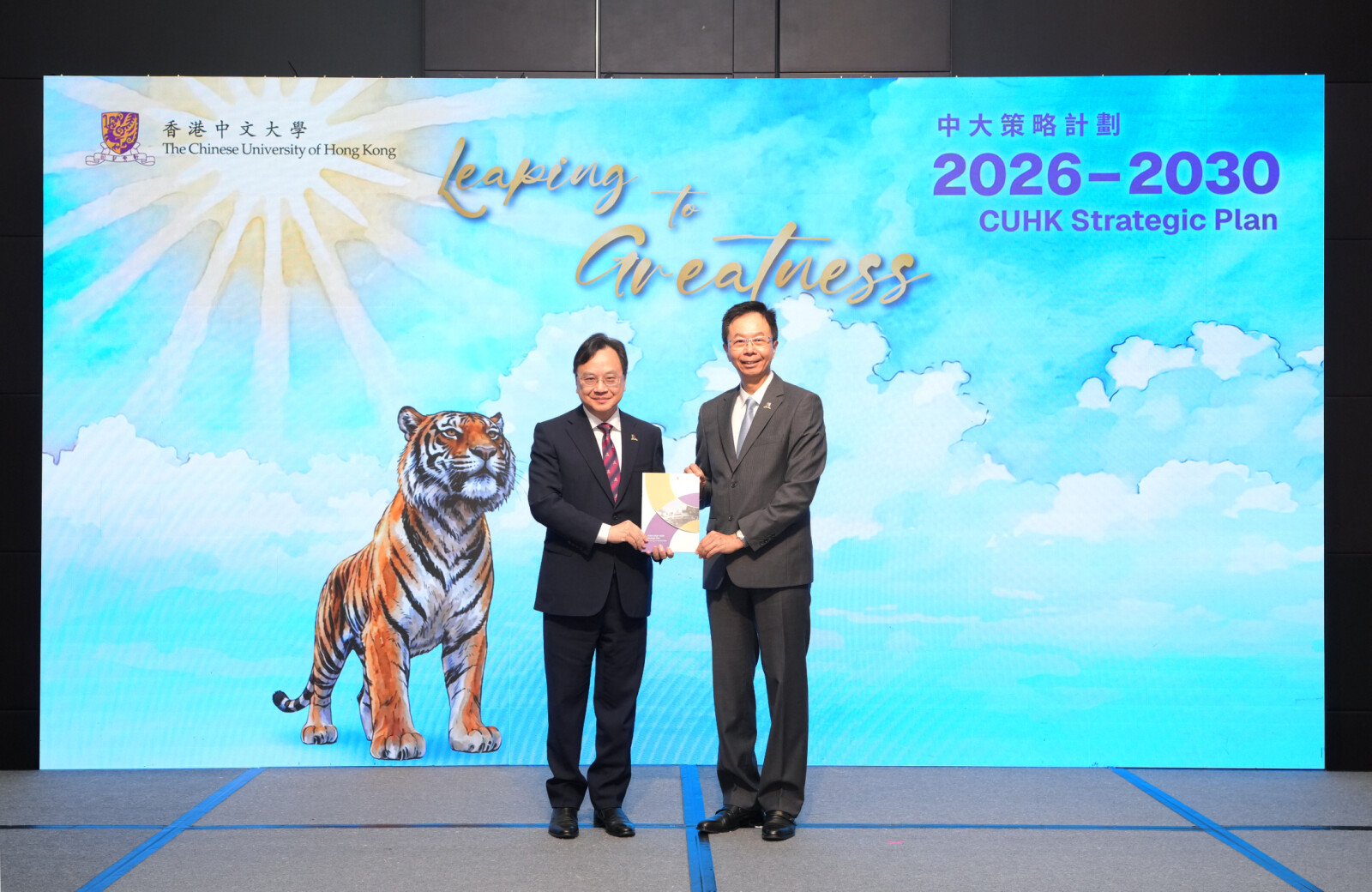 CUHK hosts a media luncheon to launch its five-year strategic plan. (From left) Professor Dennis Lo Yuk-ming and Professor John Chai Yat-chiu