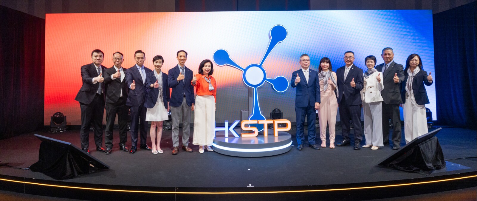 HKSTP's 25th Anniversary Prelude theme, "Innovation. Next by Nature.", brings together great minds and bold ideas to inspire what comes next for Hong Kong's innovation ecosystem. Ms Cordelia Chung, Chairman of HKSTP (6th from left), Mr Terry Wong, CEO at HKSTP (6th from right), Mr Aldous Mak, Chief Financial Officer of HKSTP (5th from left), Ms Hilda Chan, Chief Marketing Officer, HKSTP (5th from right), Ms Filla Mak, Chief Property and Asset Officer, HKSTP (4th from left), Mr Eric Or, Chief Ecosystem Development Officer, HKSTP (4th from right), Ms Fanny Wong, Chief Talent Officer, HKSTP (3rd from right), Mr Oscar Wong, Acting Chief Business Development Officer, HKSTP (2nd from right) and members from the management team officiate the event.
