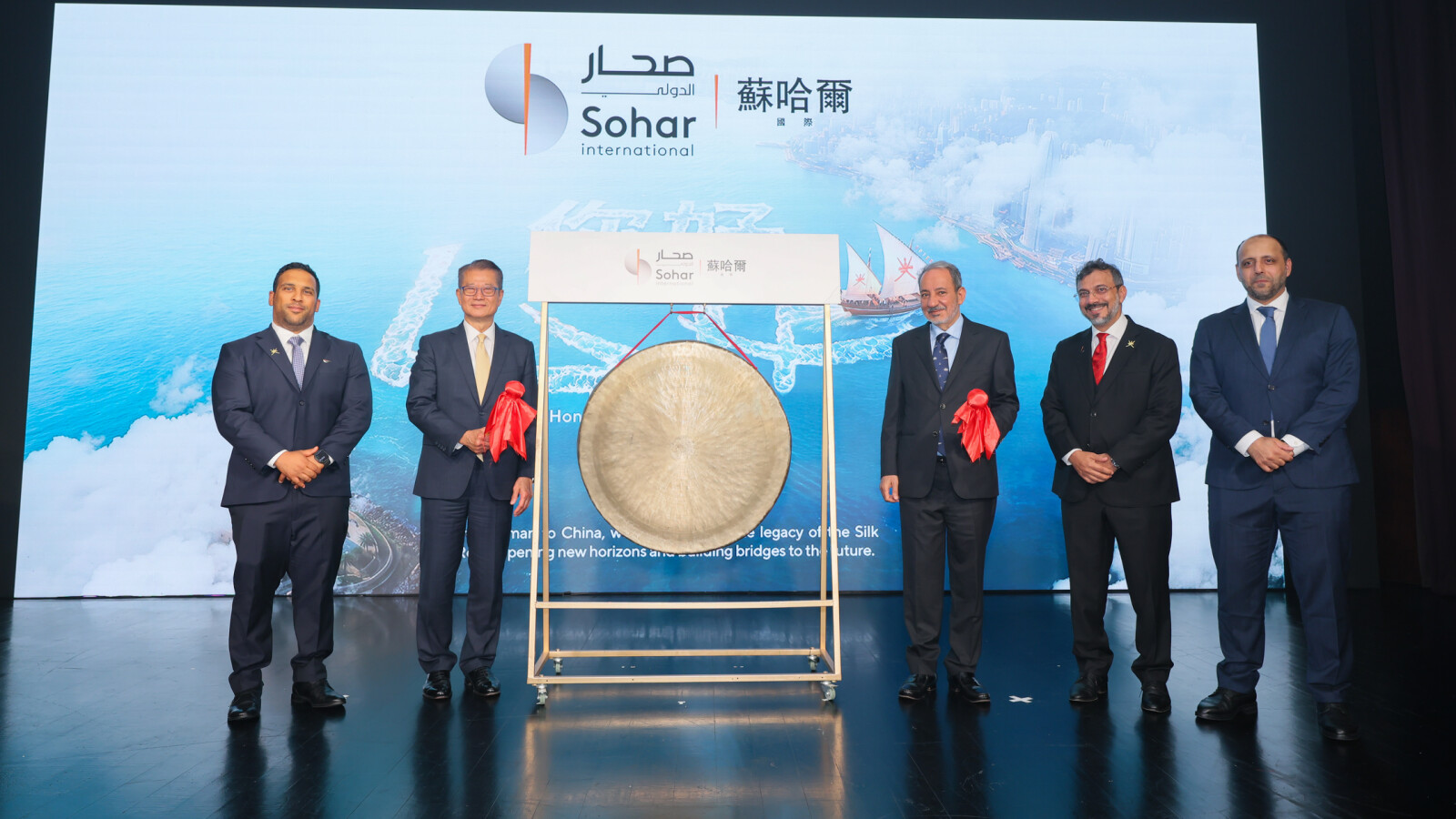 The Honourable Paul Chan Mo-po, Financial Secretary of the Hong Kong Special Administrative Region, joins senior representatives of Sohar International and Oman in striking the ceremonial gong, marking the opening of the Bank's Asia-Pacific Office in Hong Kong and a new chapter of connectivity between Oman and Asia.