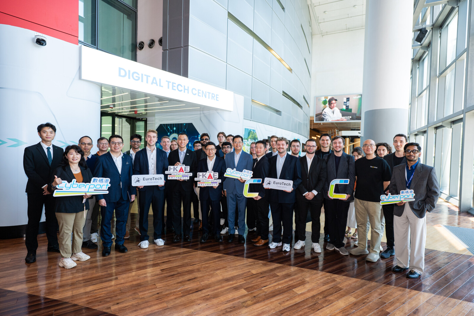Photo shows the Secretary for Labour and Welfare, Mr Chris Sun (front row, fifth left), the Director of HKTE, Mr Felix Chan (front row, forth left), and the delegation at Cyberport in Hong Kong.