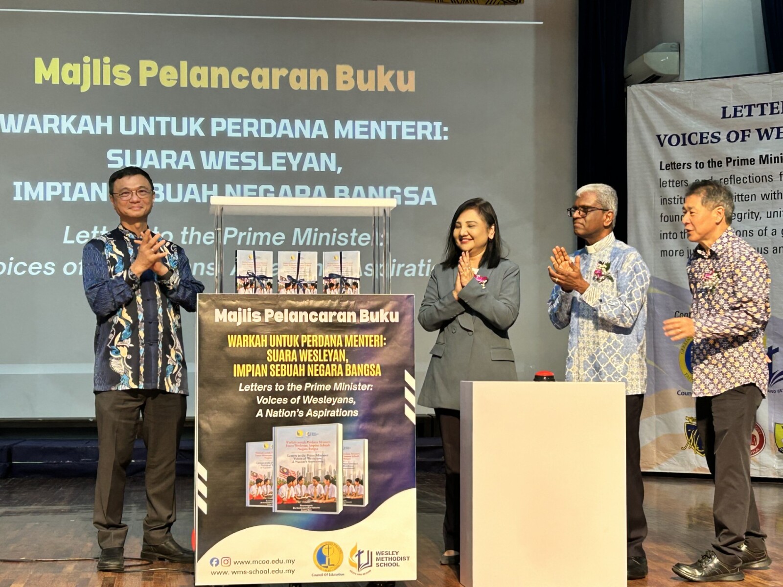 At the launch of Warkah untuk Perdana Menteri: Suara Wesleyan, Impian Sebuah Negara Bangsa (Letters to the Prime Minister: Voices of Wesleyans, A Nation's Aspirations) were (L-R) Mr. Tan Ay Zing, Chairman, Board of Management, Wesley Methodist School; Puan Siti Bahijah binti Bakhtiar, Deputy Director, Services and Multilateral Relations Sector, Private Education Division, Ministry of Education Malaysia; Bishop Dr. T. Jeyakumar, Bishop of the Methodist Church in Malaysia; and Mr. Lim Kah Cheng, Director, Methodist Council of Education.