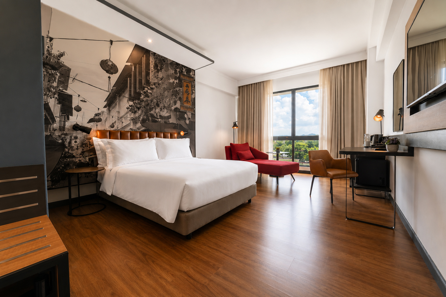 A Deluxe Queen Room at Dusit Princess Ipoh, featuring contemporary comforts and locally inspired artwork that reflects the distinctive character of the city.
