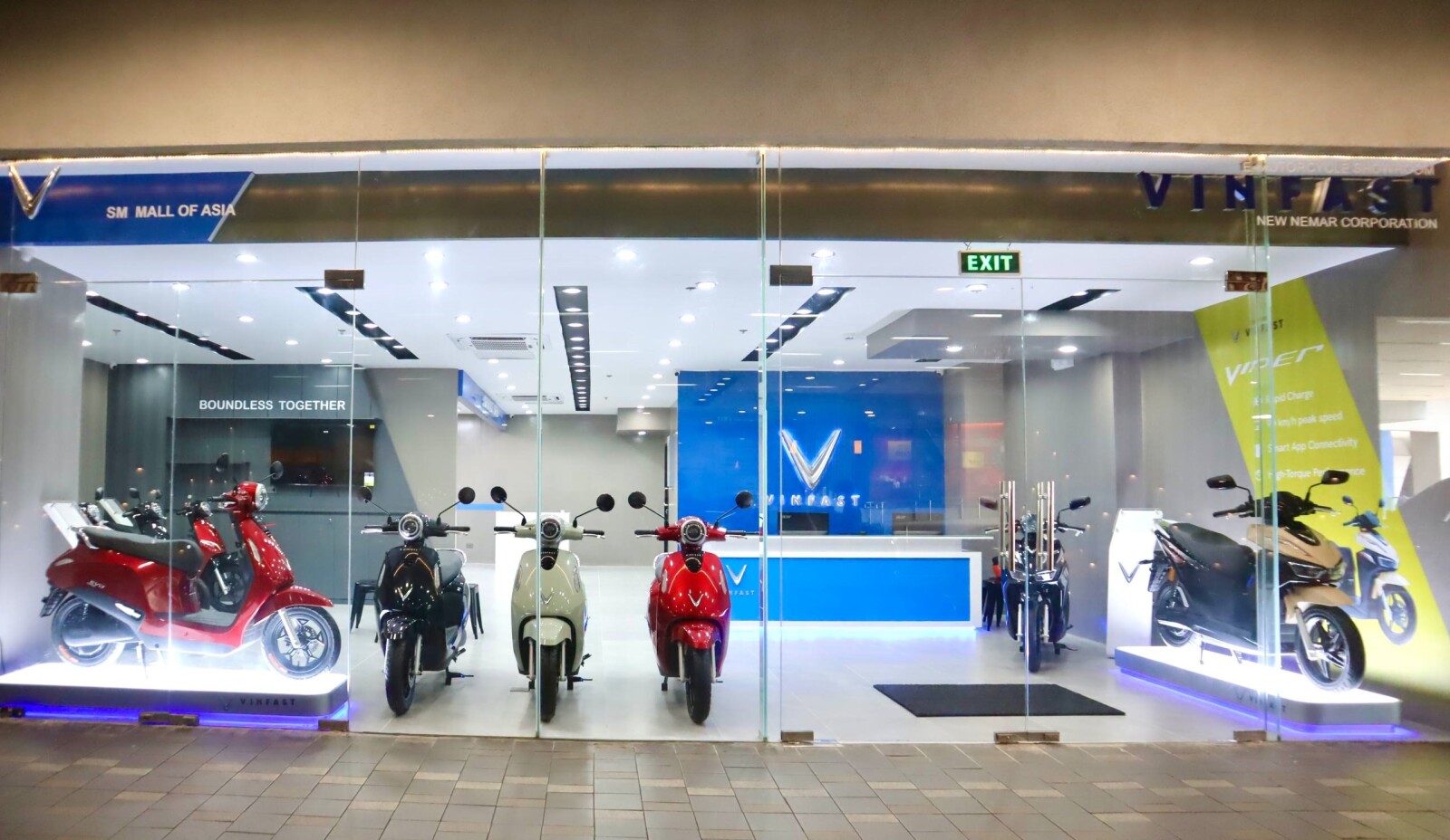 A VinFast e-motorcycle showroom at SM Mall of Asia in the Philippines, part of the company's growing dealer network across Southeast Asia.