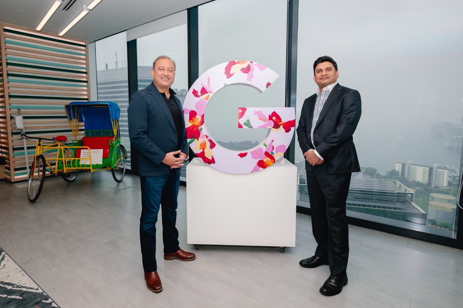 Ratnakar Garikipati, Founder, Chair, and CEO of LeapThought, alongside Rahul Sharma, Google Cloud Managing Director, APAC Public Sector. The partnership combines LeapThought's specialized AI with Google Cloud's Gemini models and sovereign infrastructure to deliver secure data control and end-to-end intelligence for infrastructure assets.